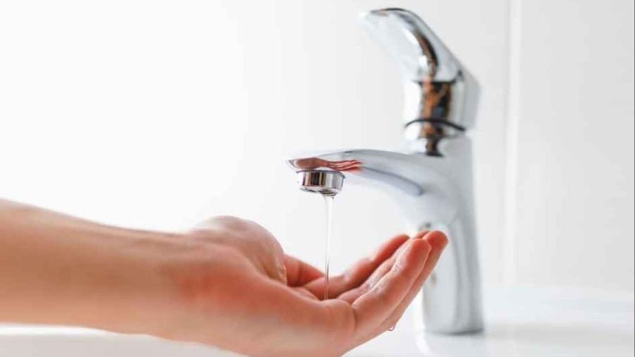Checking water pressure of a faucet